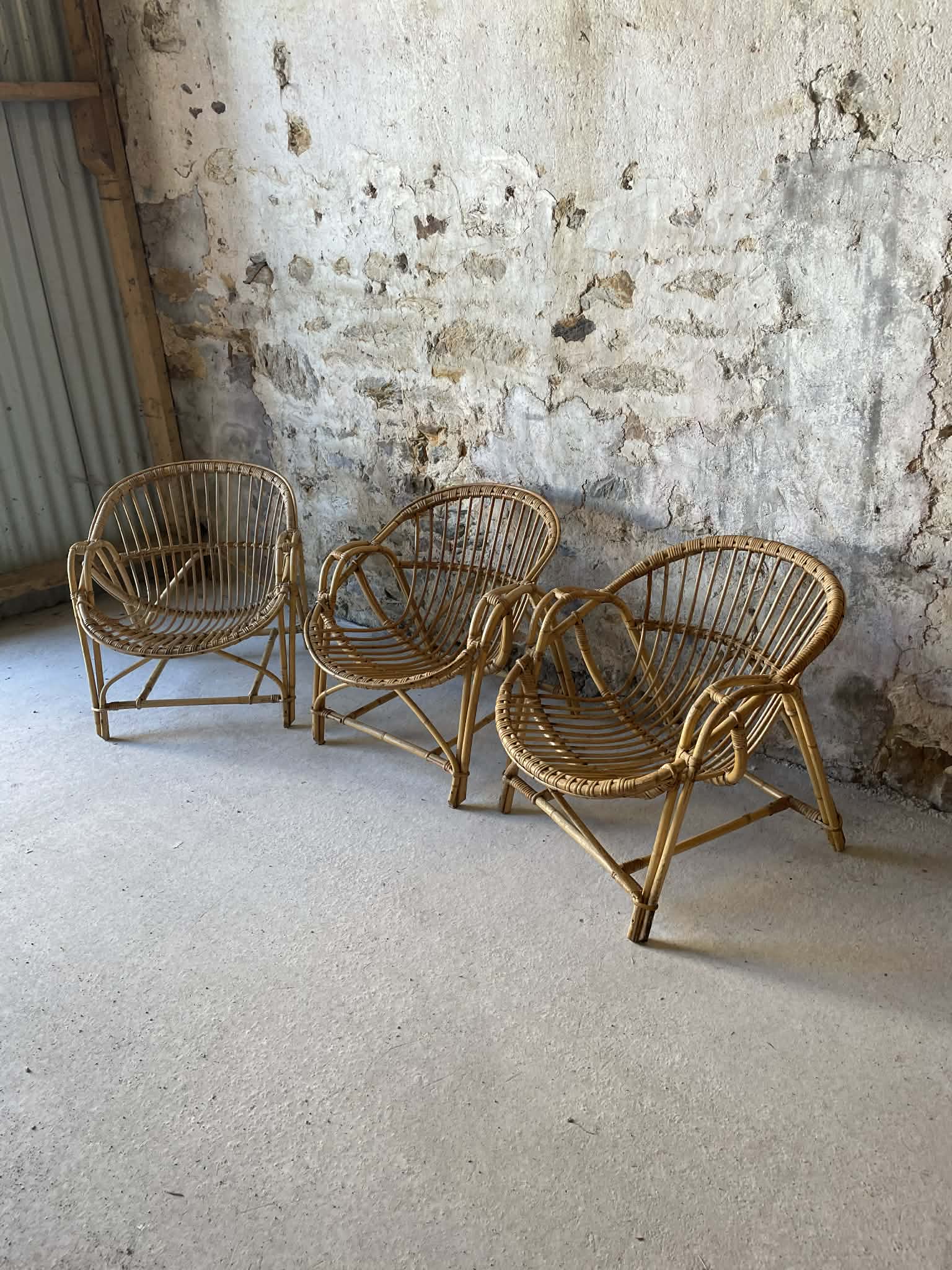 Vintage wicker armchair from the 1970s.