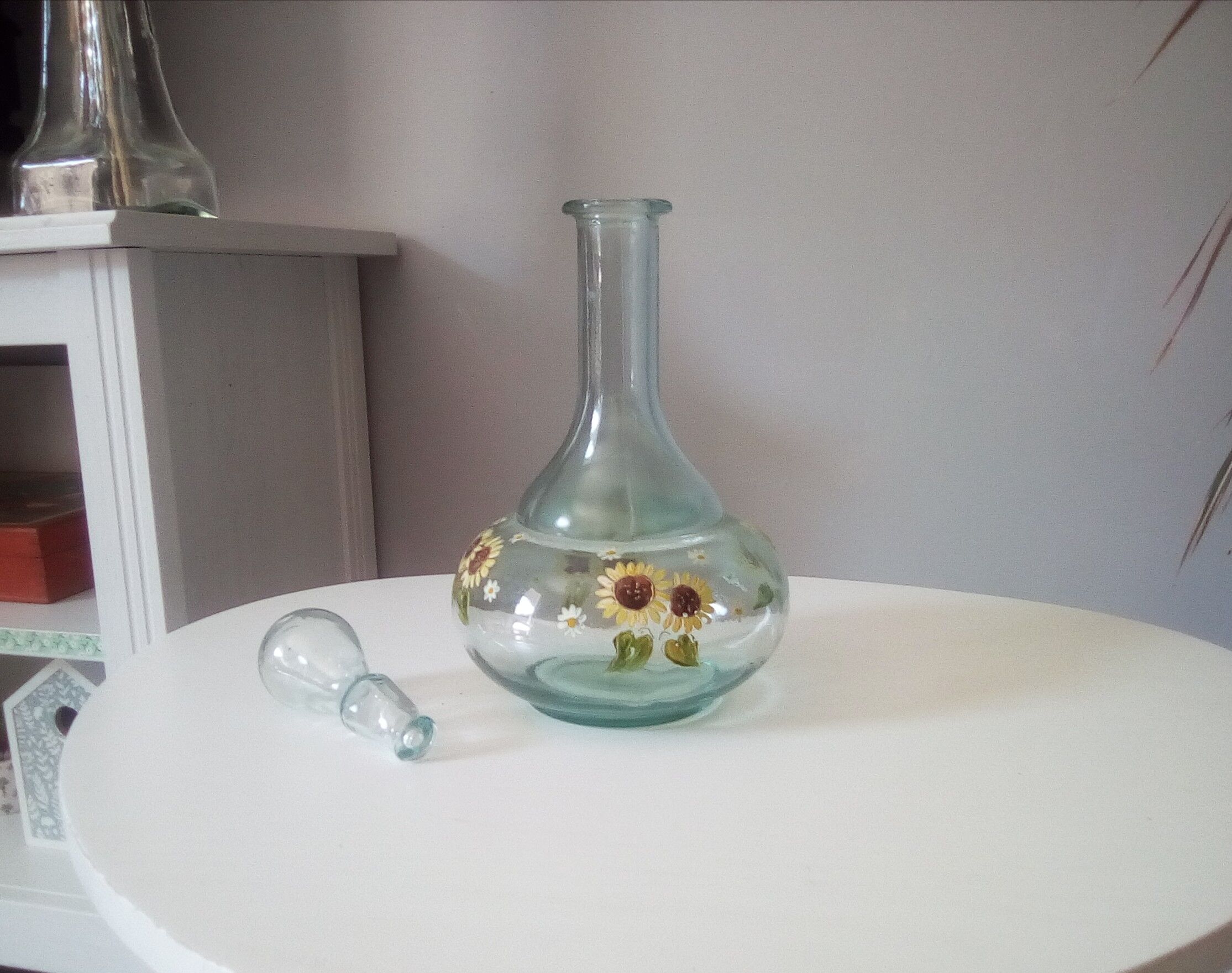 Old carafe bluish glass