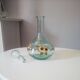 Old carafe bluish glass