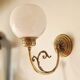 Pair of Napoleon III style brass and opaline wall lights