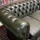 Chesterfield 2-seater green leather sofa from the 1980s
