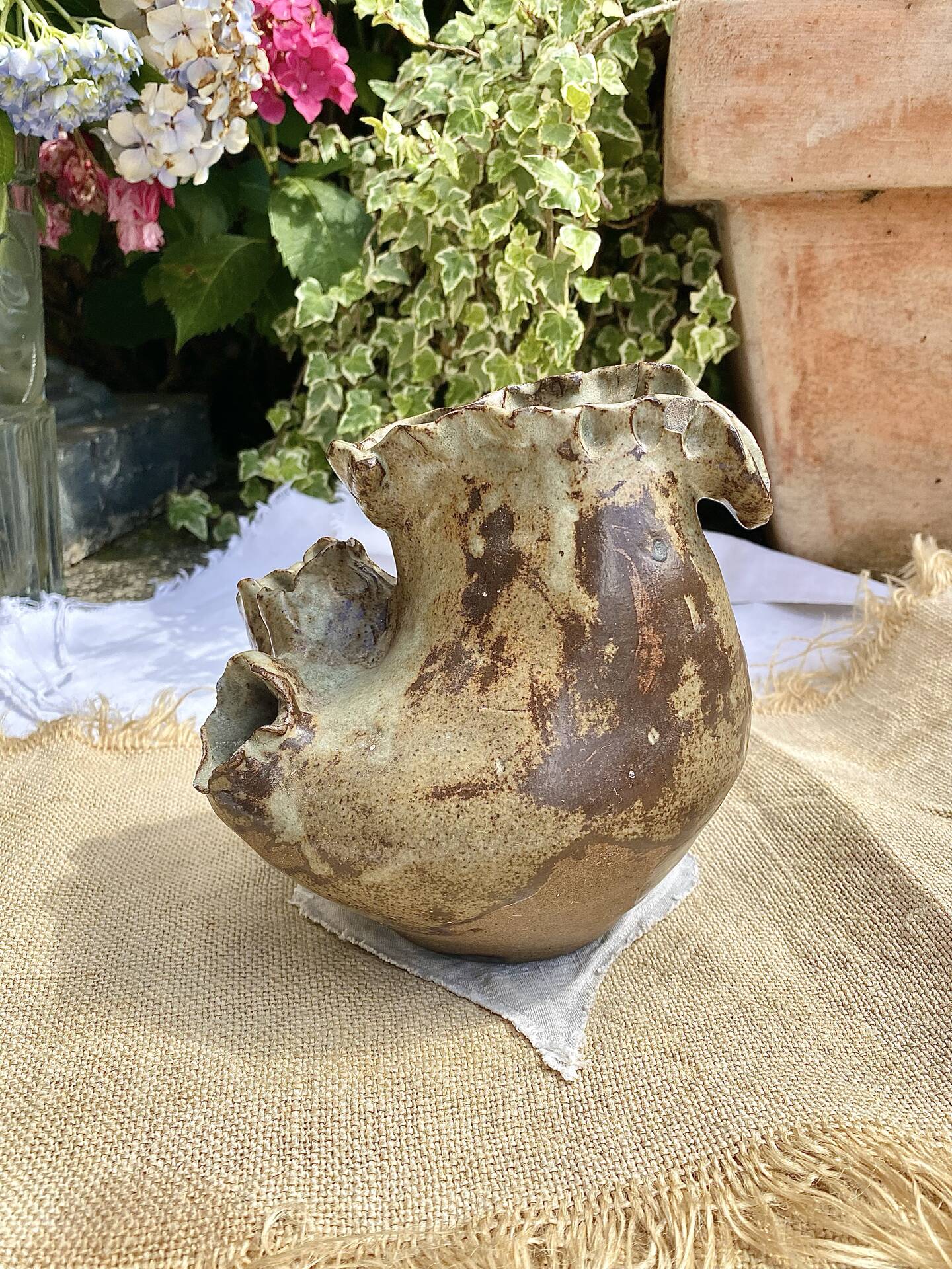 Sculptural vase in glazed stoneware, free form.