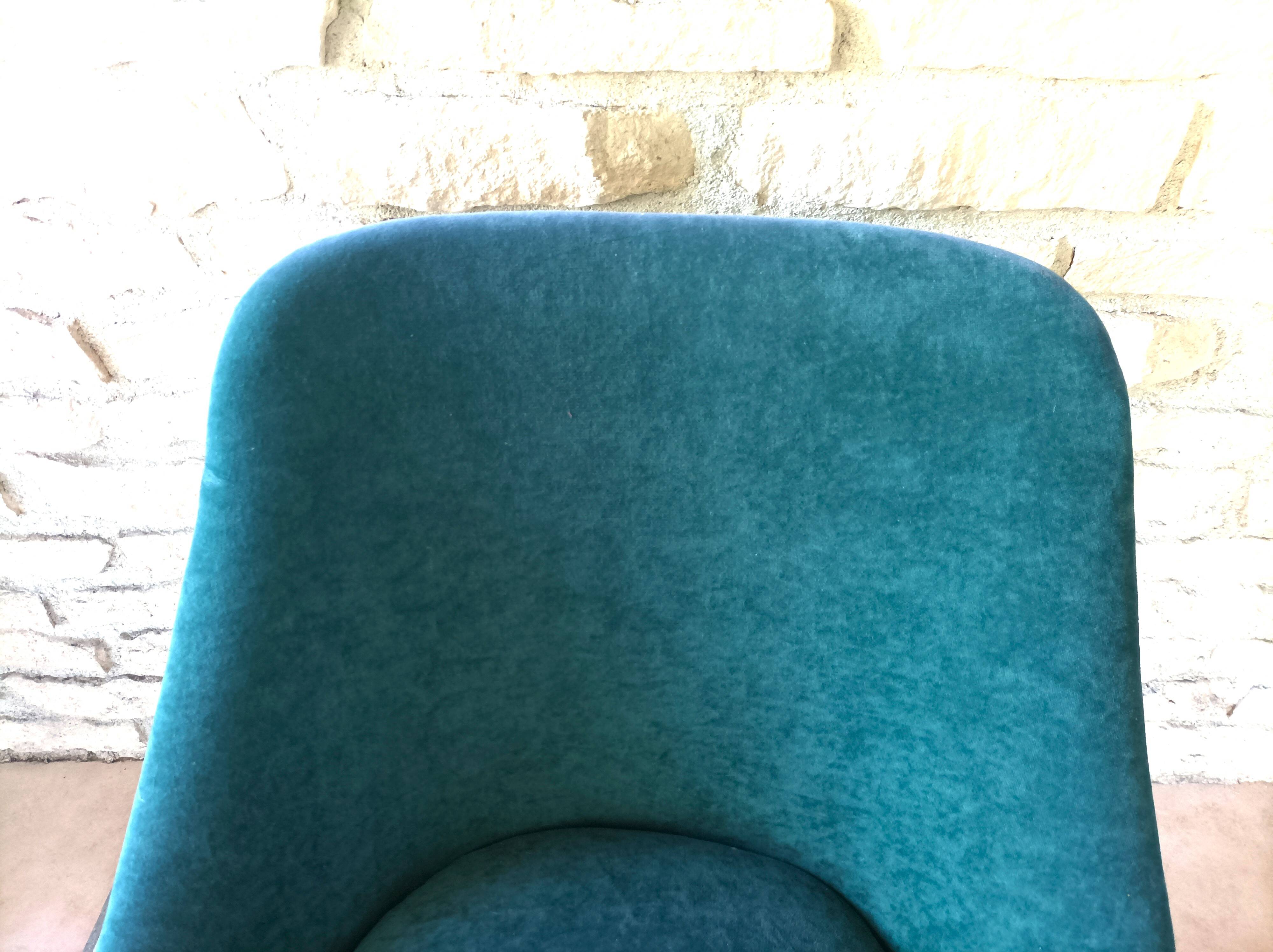 Green velvet armchair