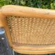 Wooden chair with caning in the style of Marcel Breuer.