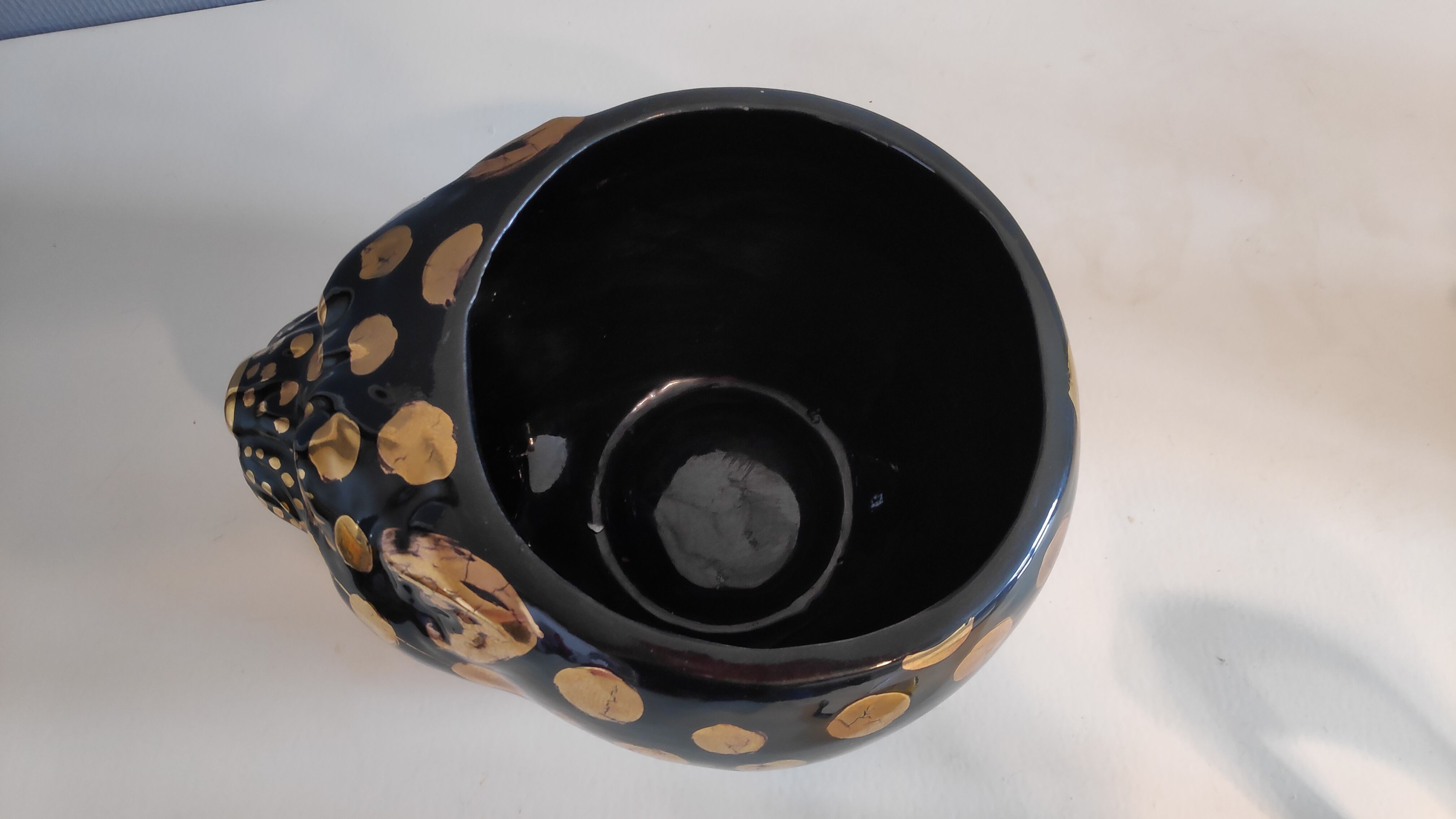 black and gold ceramic panther pot cache