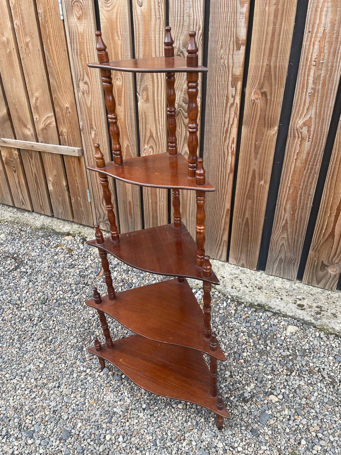 Wooden corner shelf on legs with 5 shelves