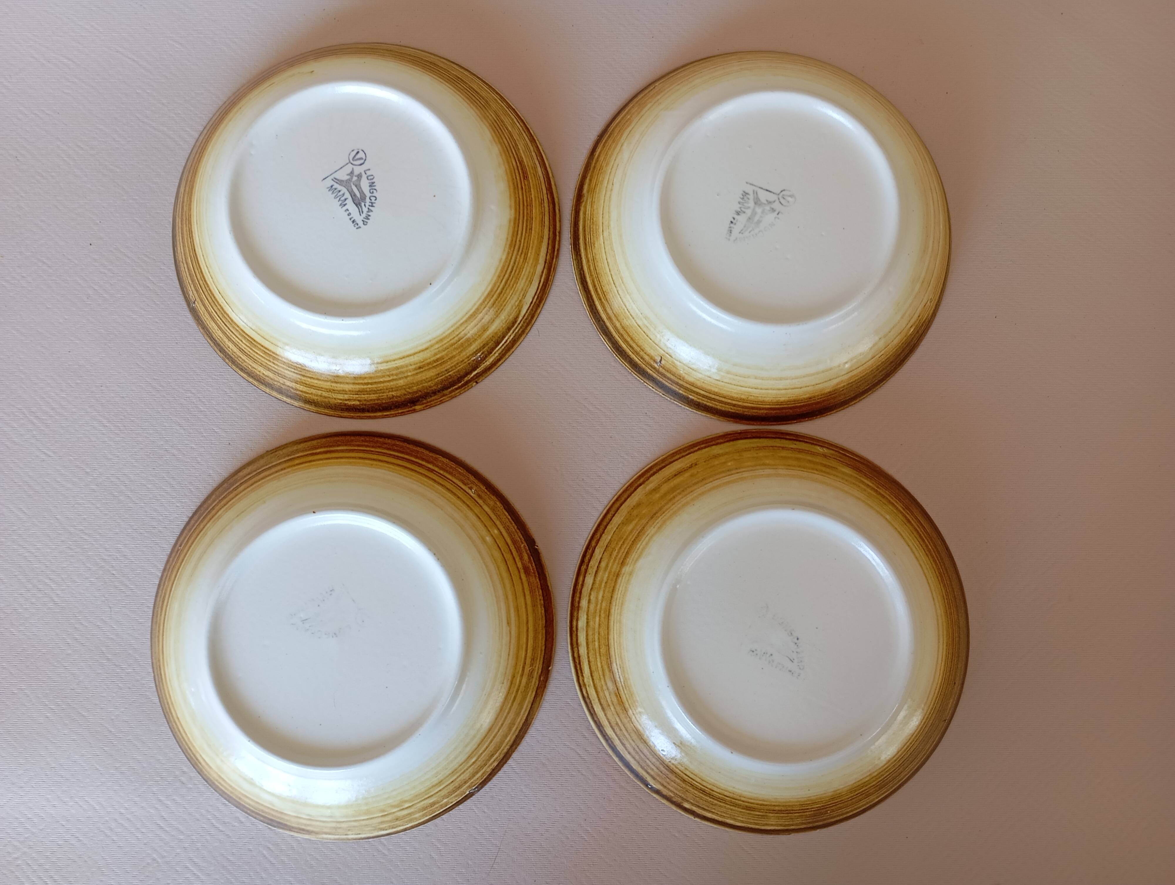 4 Longchamp calotte plates