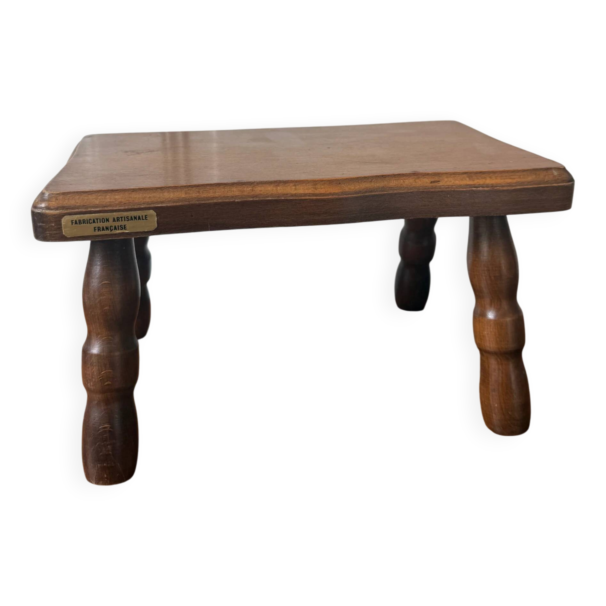 Old wooden milking stool