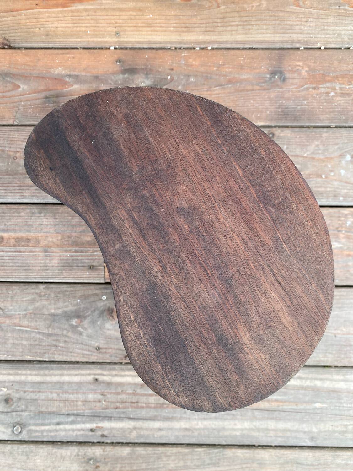Teak stool in a bean shape