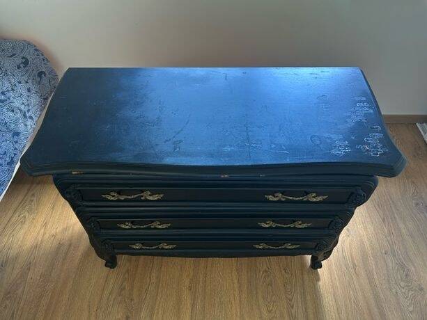 Louis XV style black and gold commode