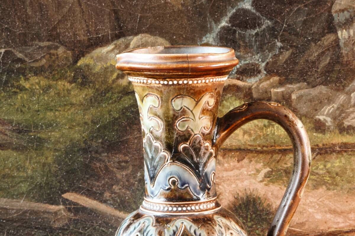Doulton Lambeth stoneware jug (1879), floral decoration by Henry Winstanley.