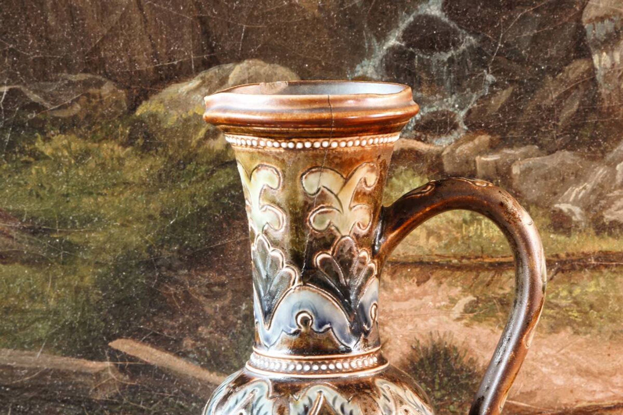 Doulton Lambeth stoneware jug (1879), floral decoration by Henry Winstanley.