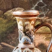 Doulton Lambeth stoneware jug (1879), floral decoration by Henry Winstanley.