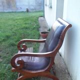 Fauteuil  à crosse assise en cuir