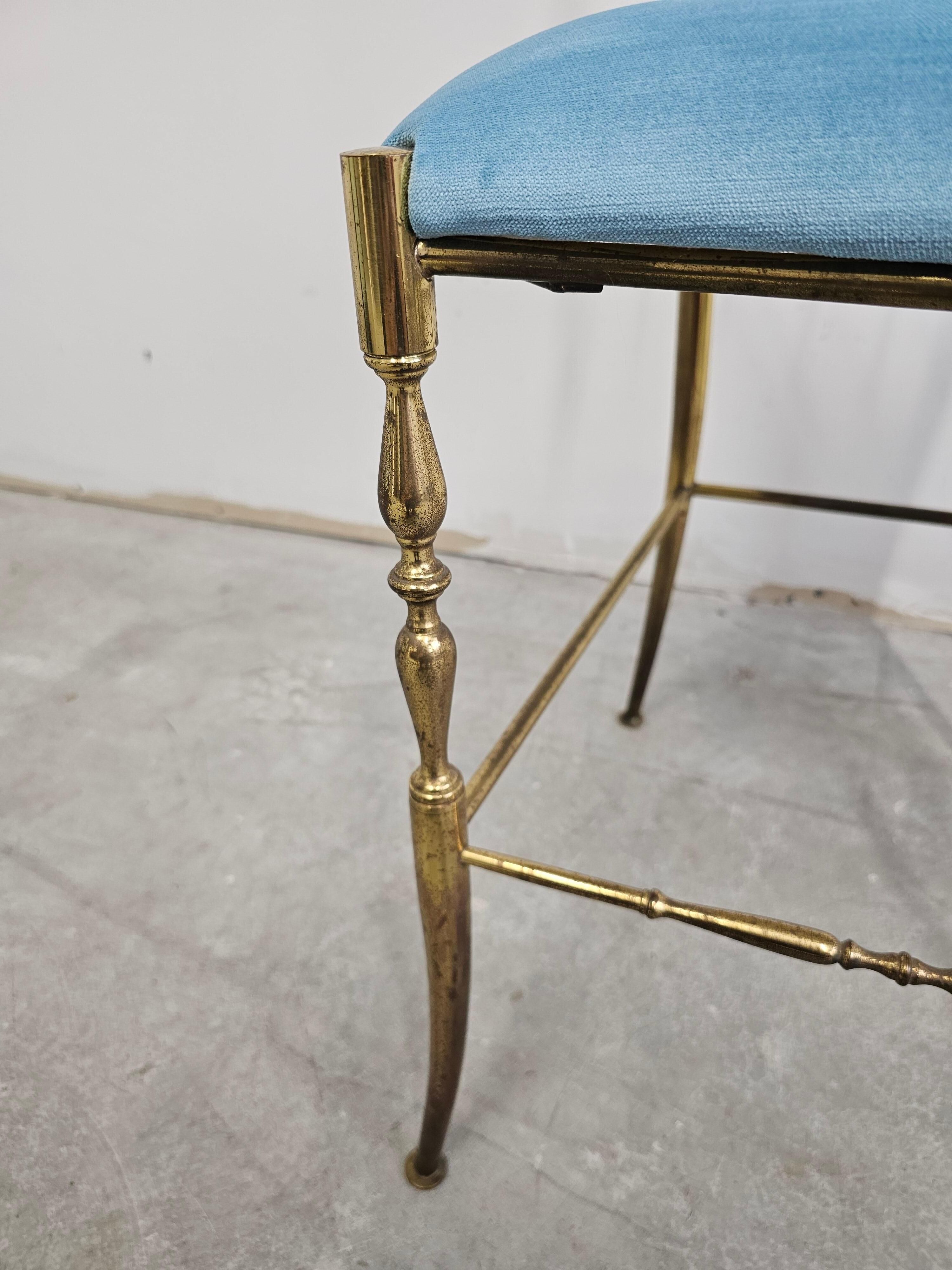 Mid-century Chiavari accent chair in solid brass with a plush seat.