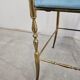 Mid-century Chiavari accent chair in solid brass with a plush seat.