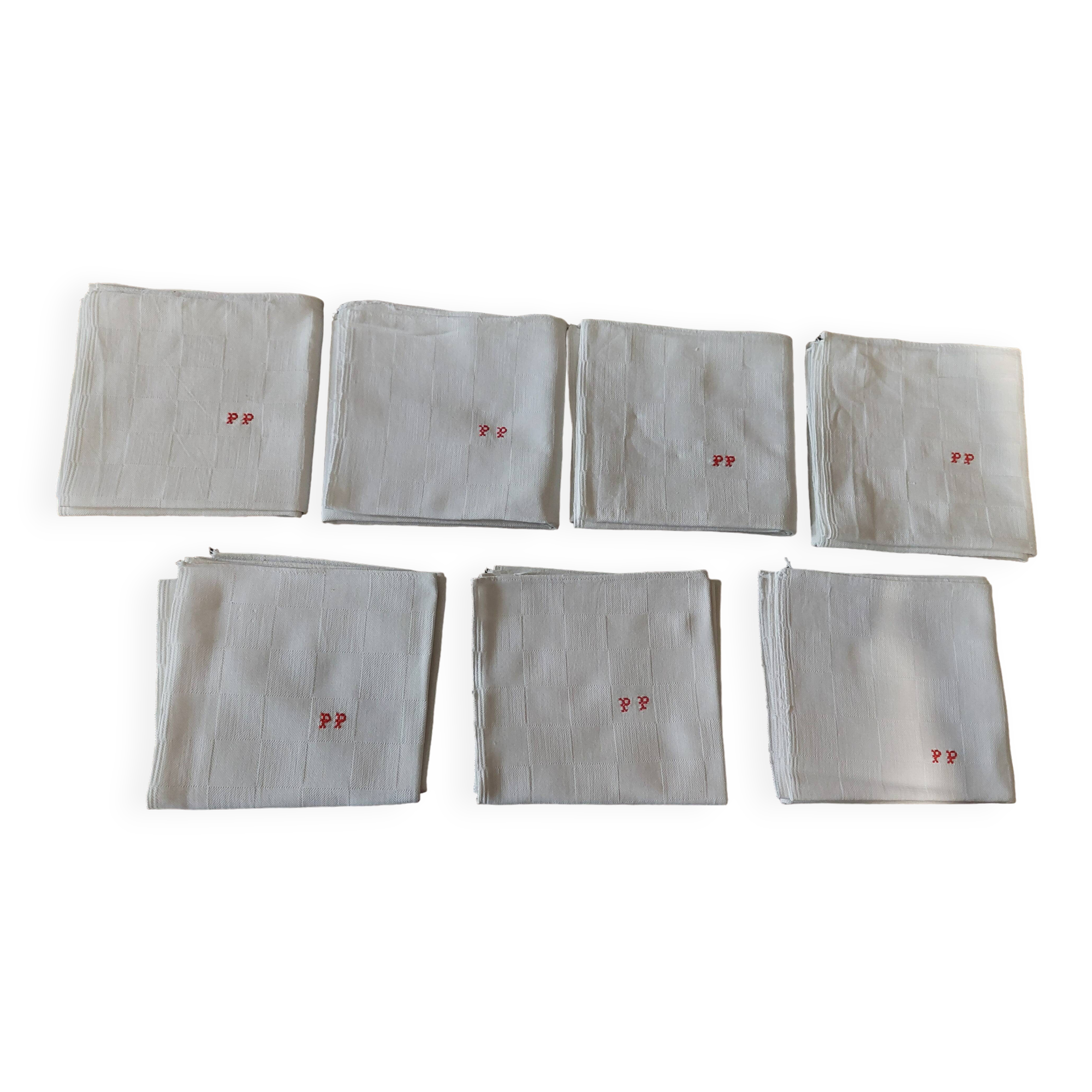 Set of seven monogram PP damask cotton napkins 56 x 56 cm