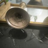 Twisted candlestick in gold metal