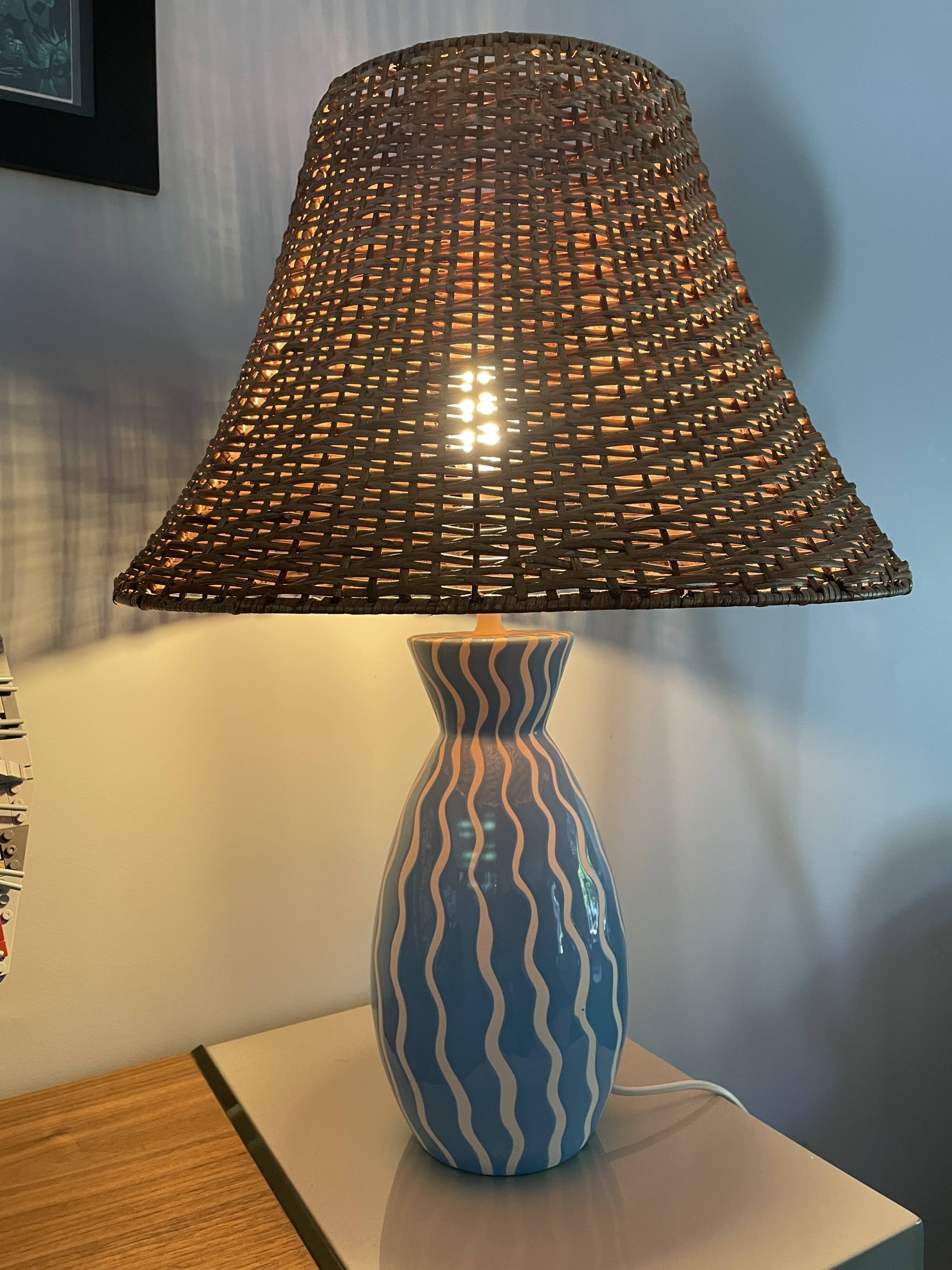 Blue ceramic lamp and rattan