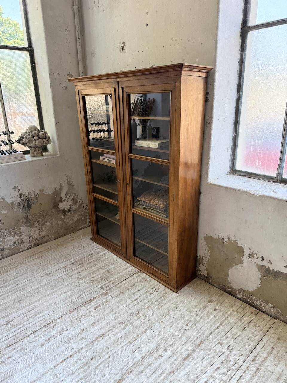 Glass-fronted walnut library 1900
