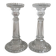 Column candle holders in moulded glass made in France.
