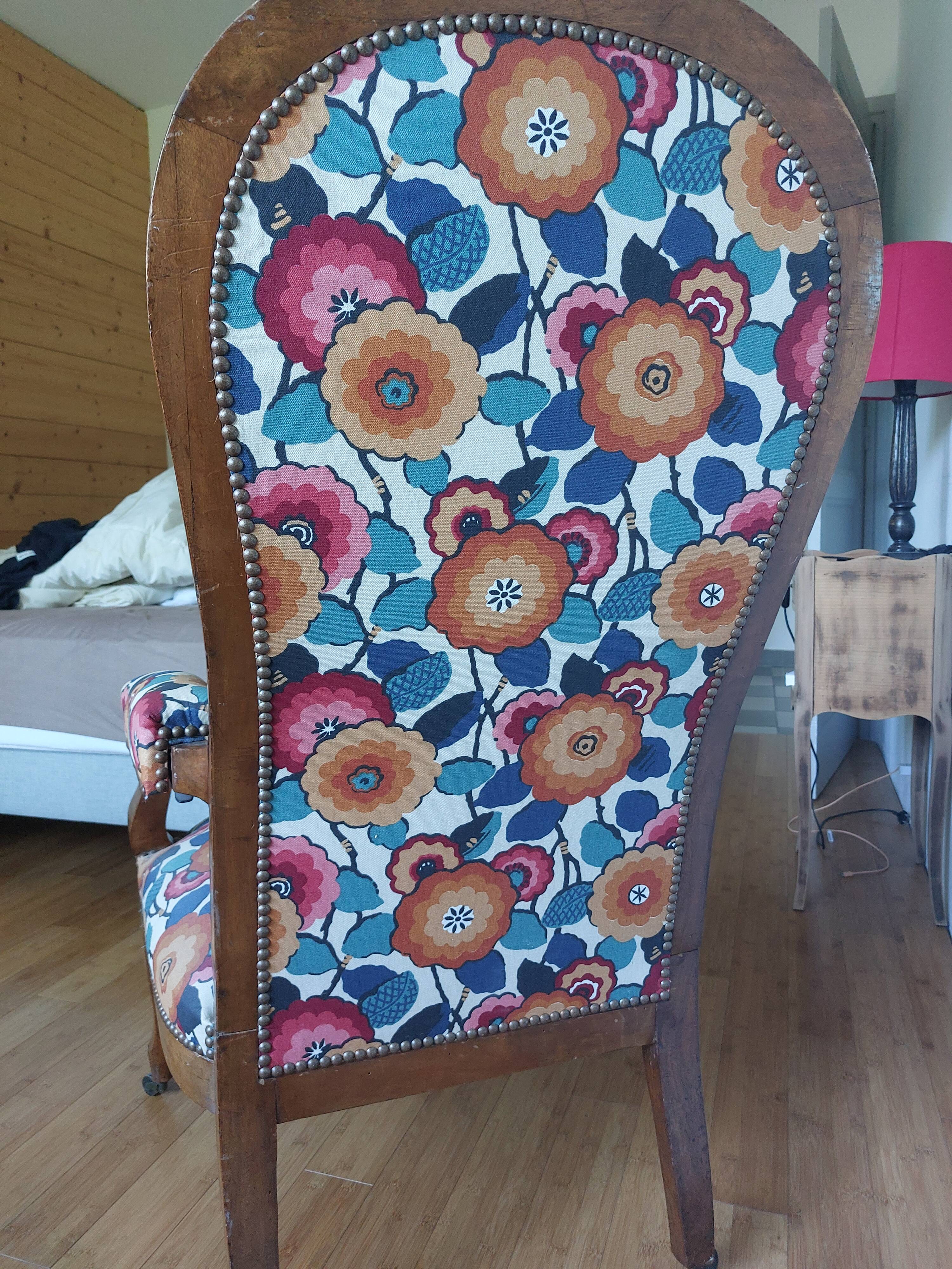 Voltaire armchair with a rack, wheels, and a toad chair in matching fabric.