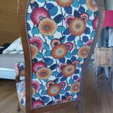 Voltaire armchair with a rack, wheels, and a toad chair in matching fabric.
