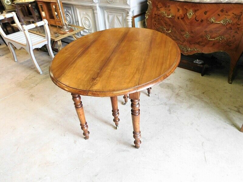 Table 6 feet Louis Philippe with 3 walnut extensions of the 19th siecle