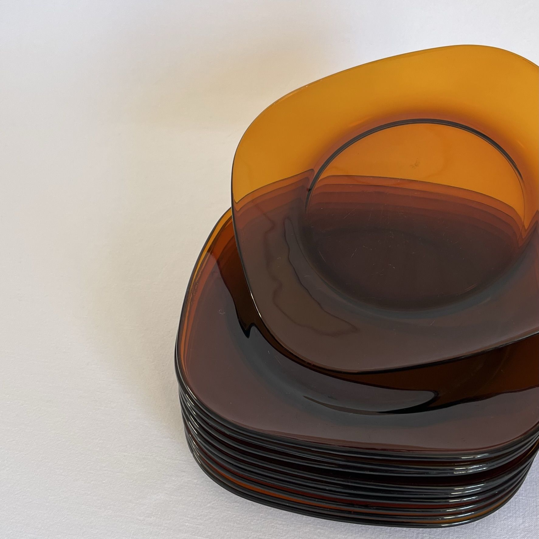 Set of 10 square Vereco plates in amber glass