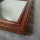 Wooden hanging mirror with vintage carved knot