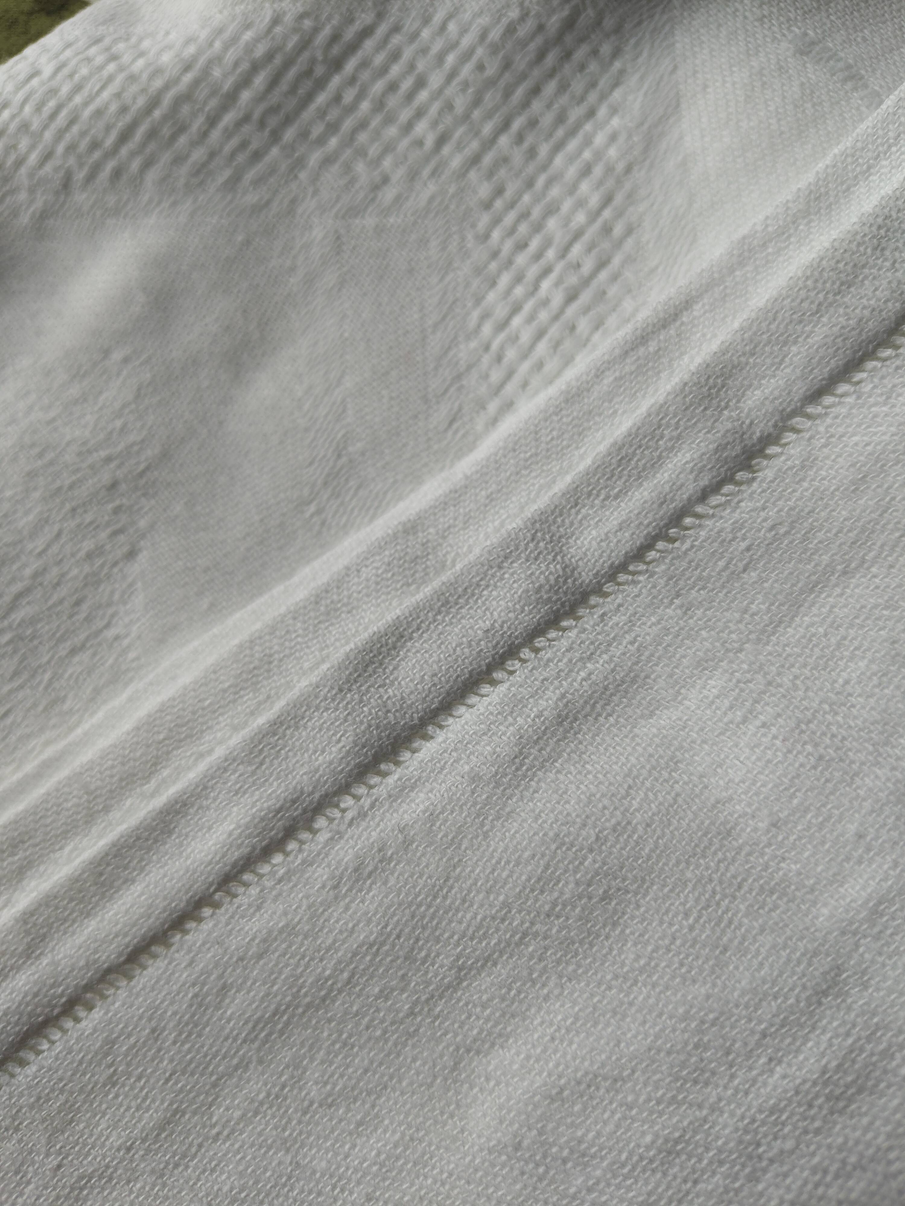 Old white damask cotton tablecloth