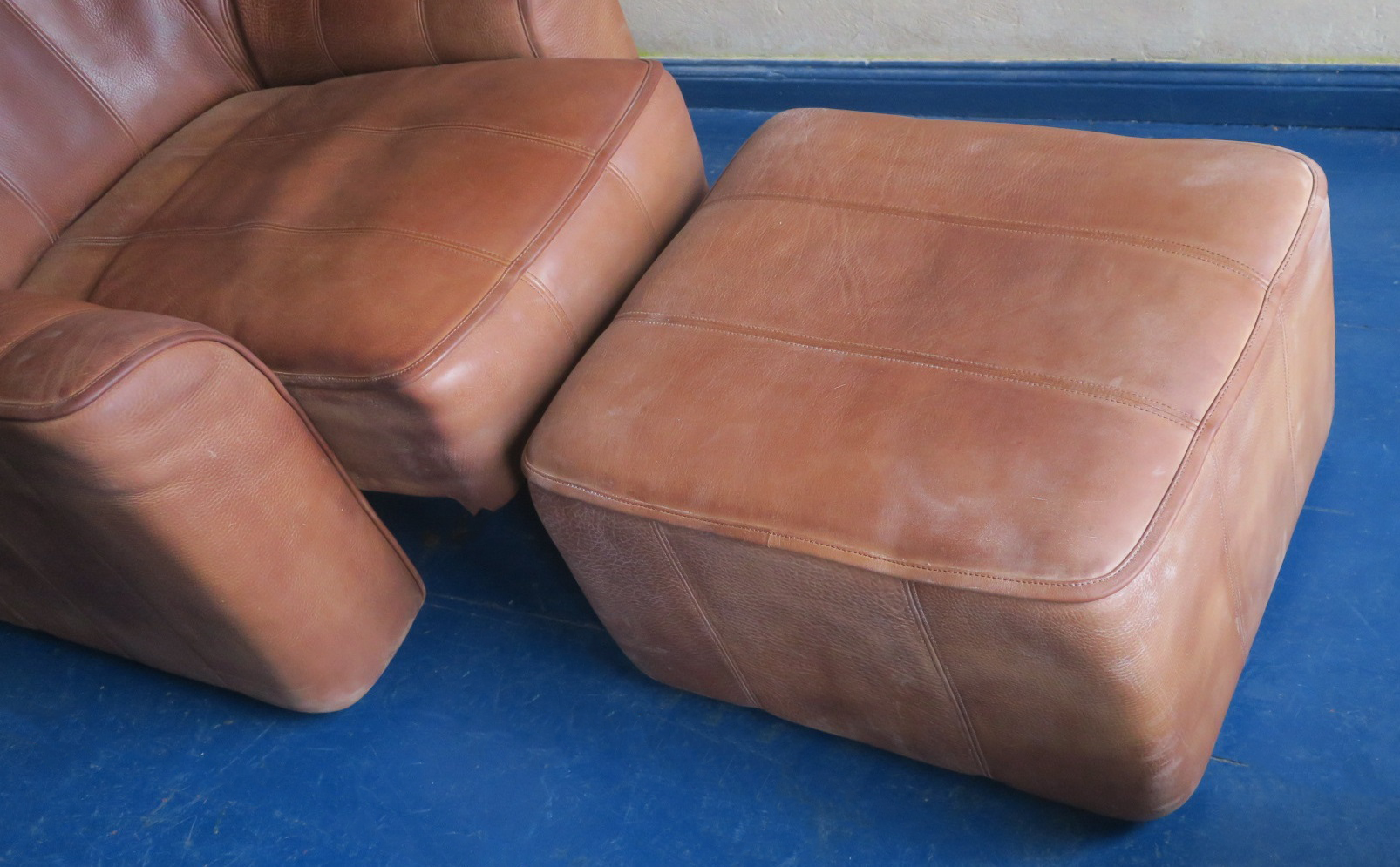 De Sede model DS44 patinated buffalo leather lounge chair and ottoman, 1970s