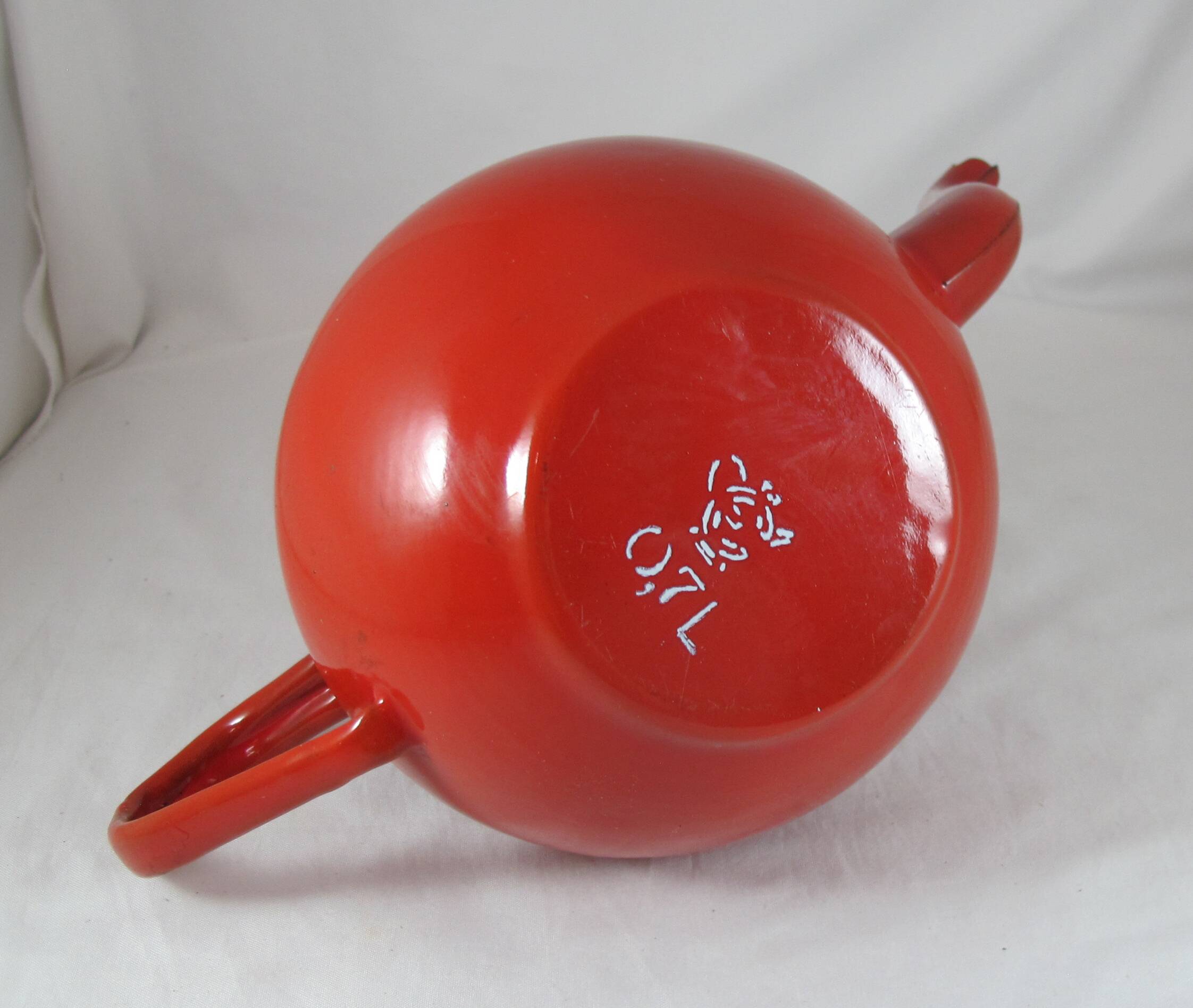 Vintage teapot coffee maker in red enameled metal