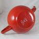 Vintage teapot coffee maker in red enameled metal