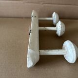 Antique wooden wall-mounted coat rack