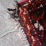 Ancien tapis en laine fait main