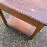 Vintage farmhouse dessert trolley on wheels made of solid wood from the 19th century.