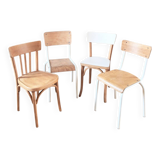 Set of 4 reimagined and mismatched vintage chairs