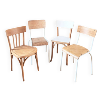 Set of 4 reimagined and mismatched vintage chairs