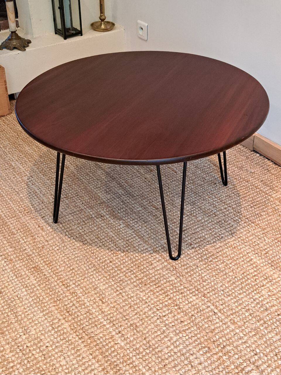 Round coffee table with mahogany wood top