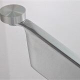 Vintage chrome coffee table with X frame and round glass top, 1980s