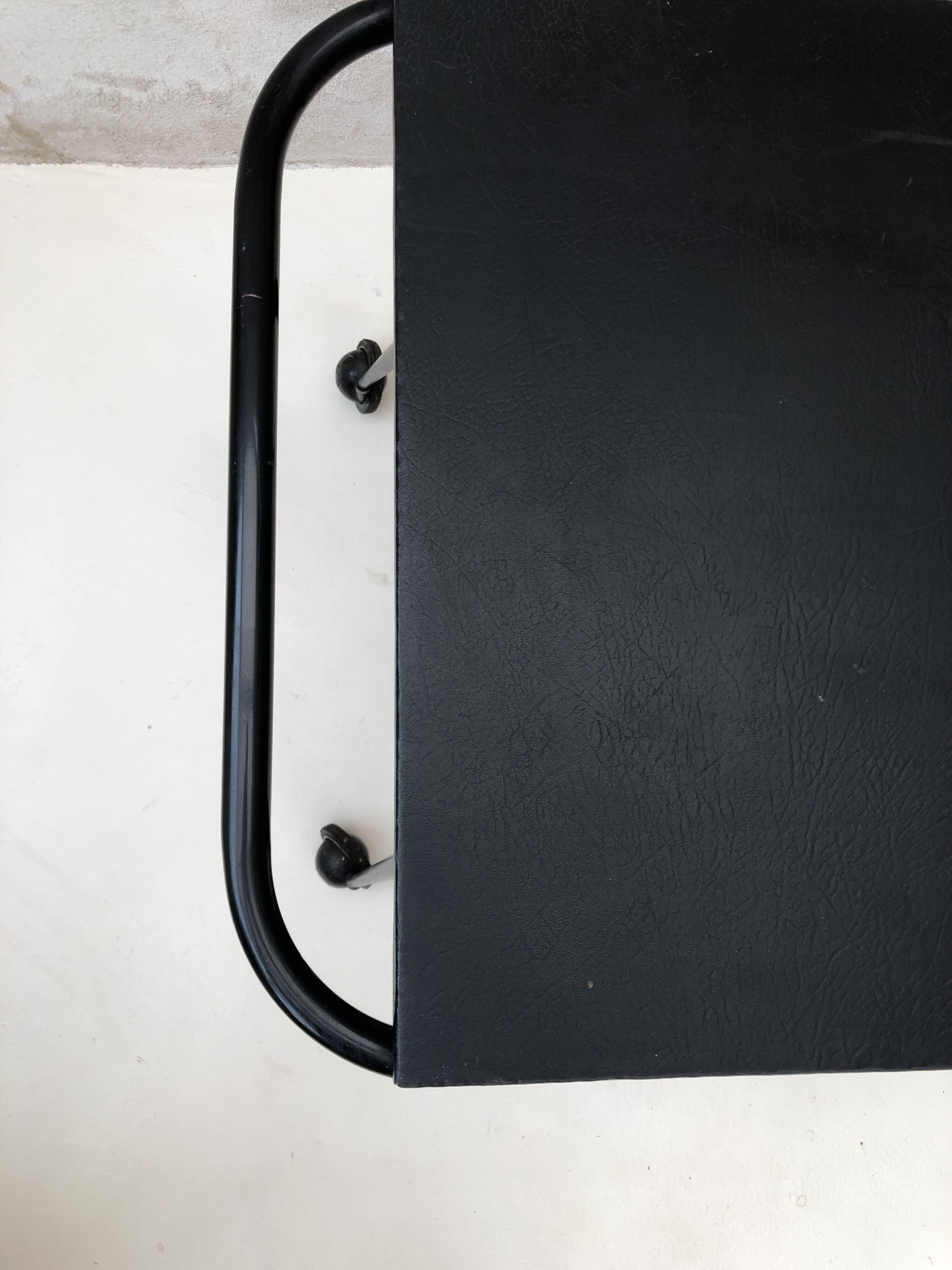 Black table on wheels from the 60s