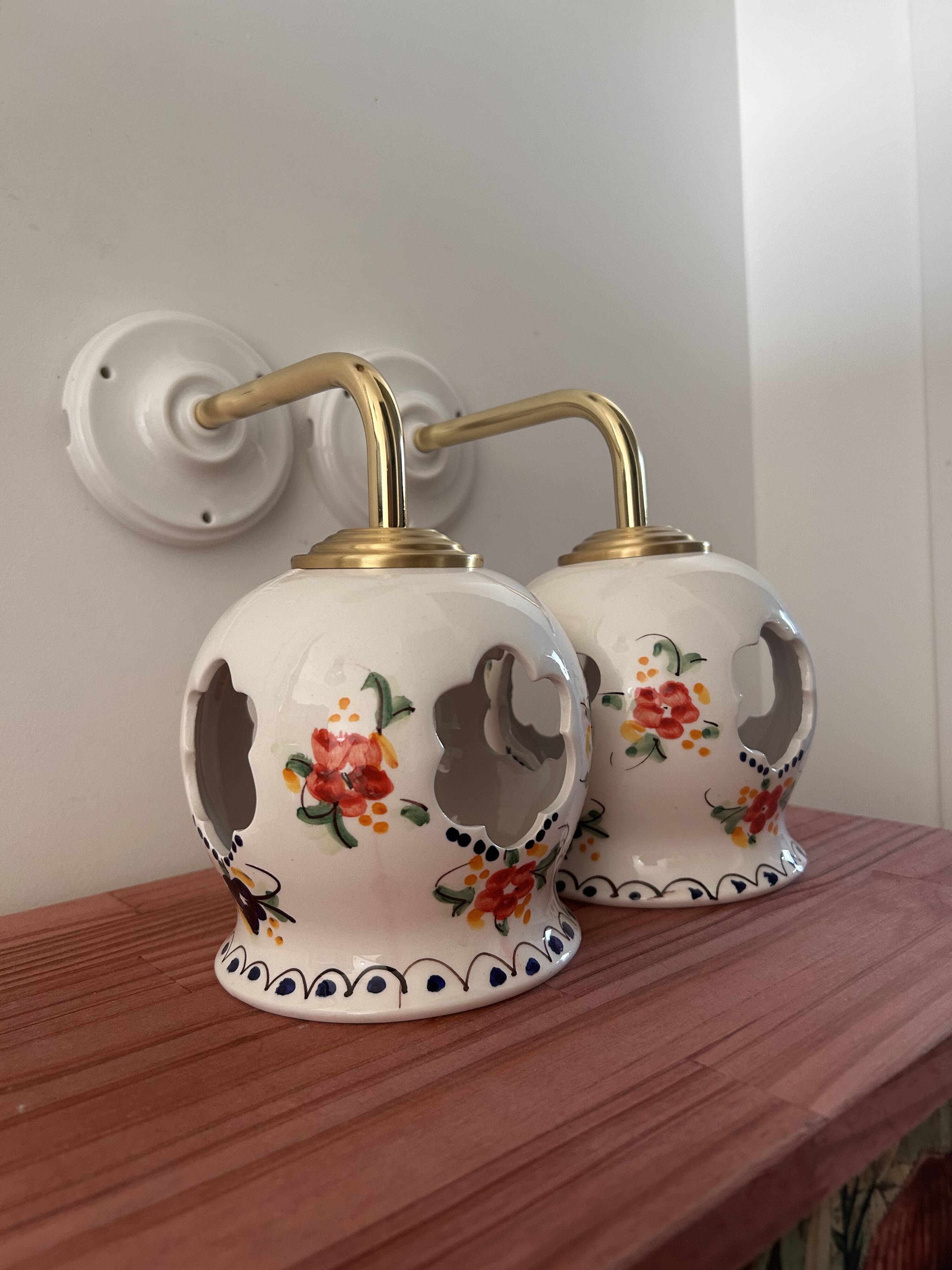 Pair of openwork ceramic wall lights