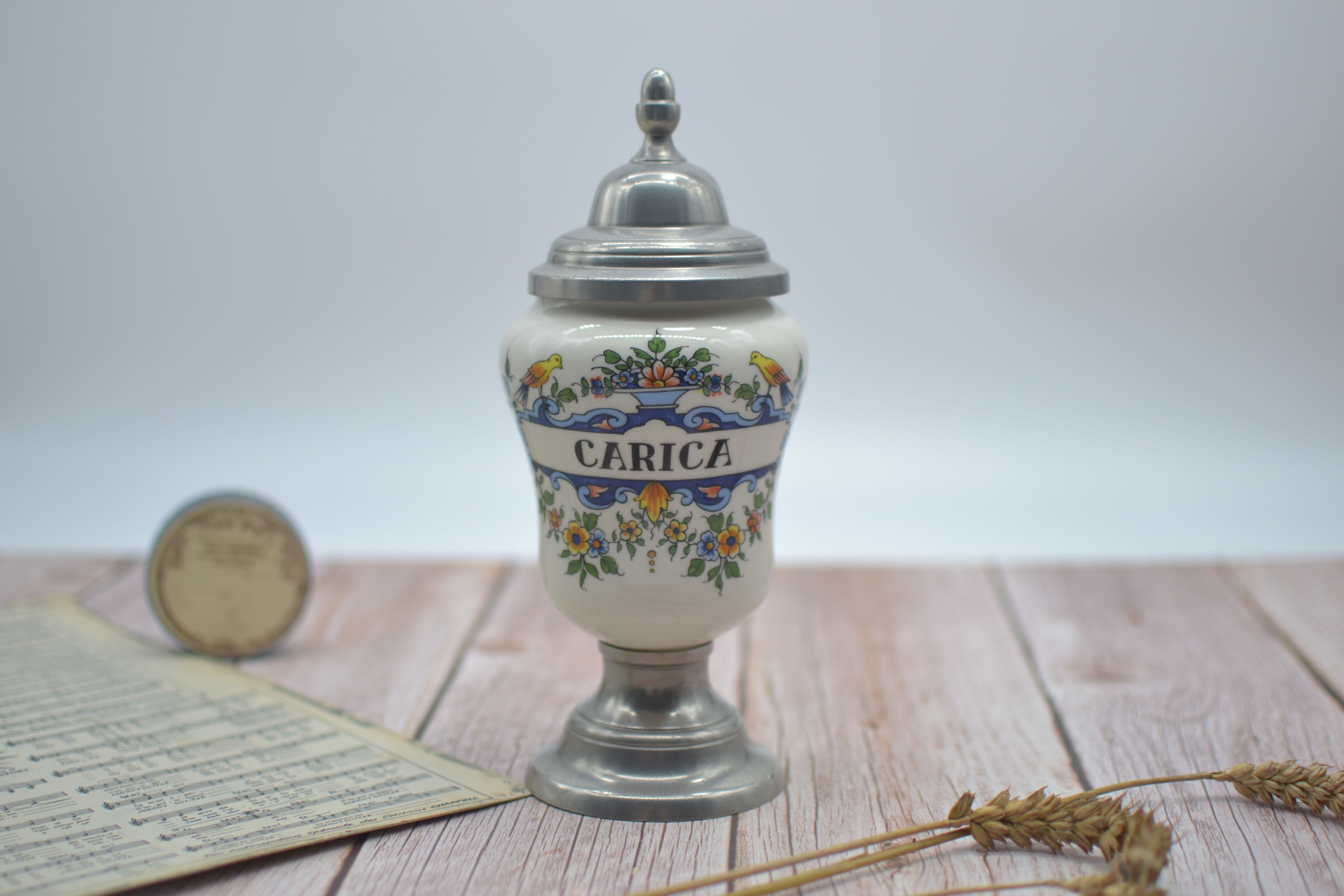Old carica pharmacy apothecary pot with lid and tin foot
