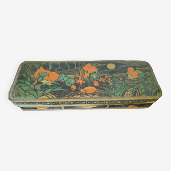 Old pen tray decorated with ducks in the moonlight