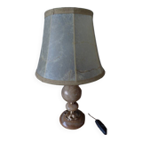 Lamp with base in polished beige-brown stones and its leather lampshade