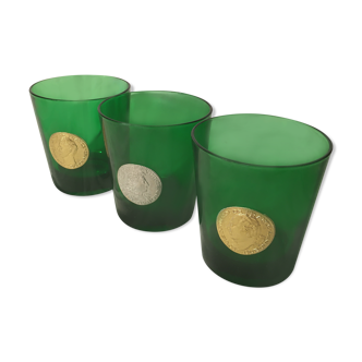 3 green glasses with silver gold shields