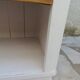 Craft furniture enhanced in pearl gray, shelves and top in raw wood.
