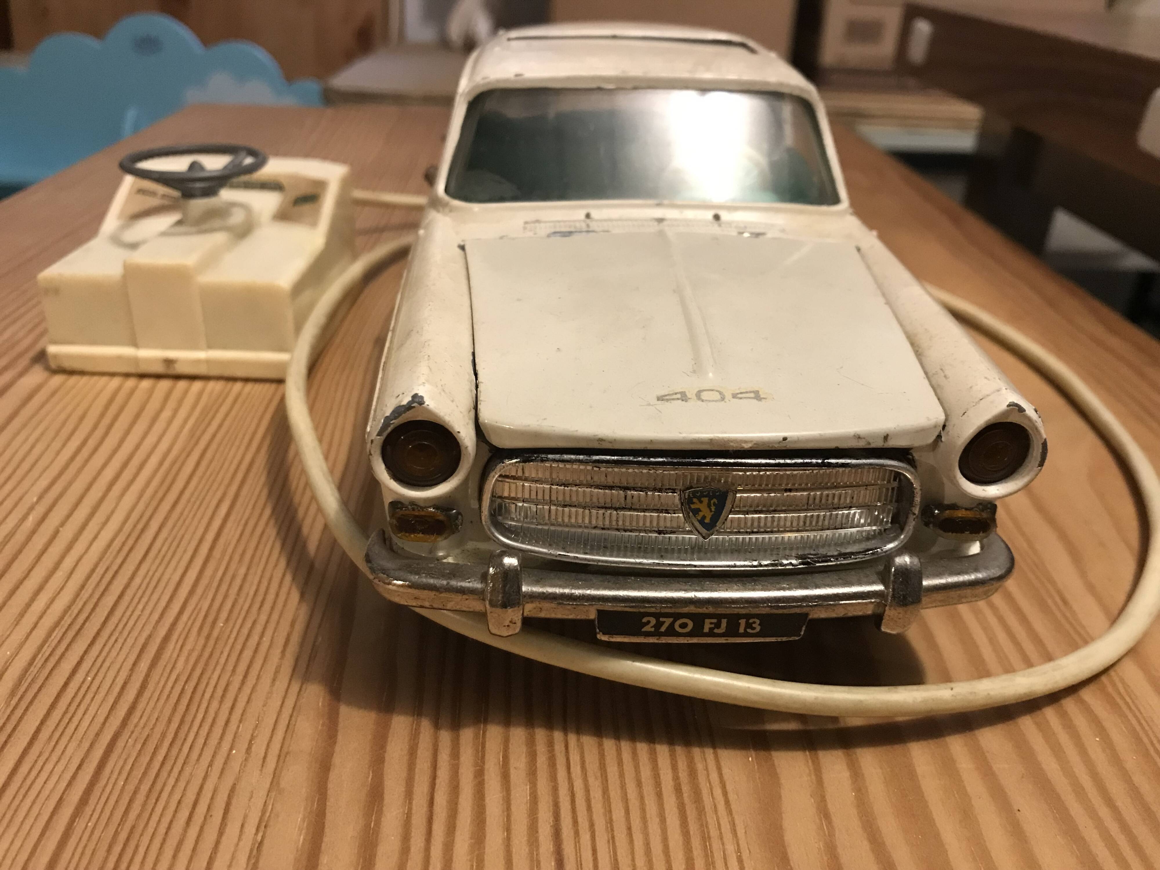 Peugeot 404 remote-controlled car from the 60s. France Jouets brand.