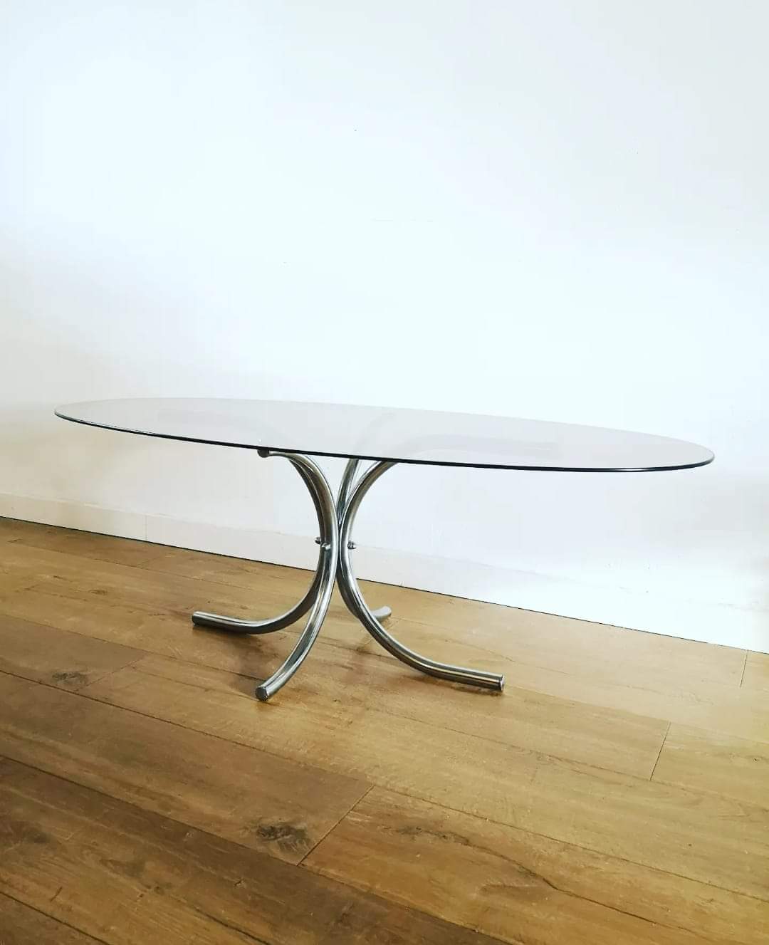 Oval smoked glass coffee table